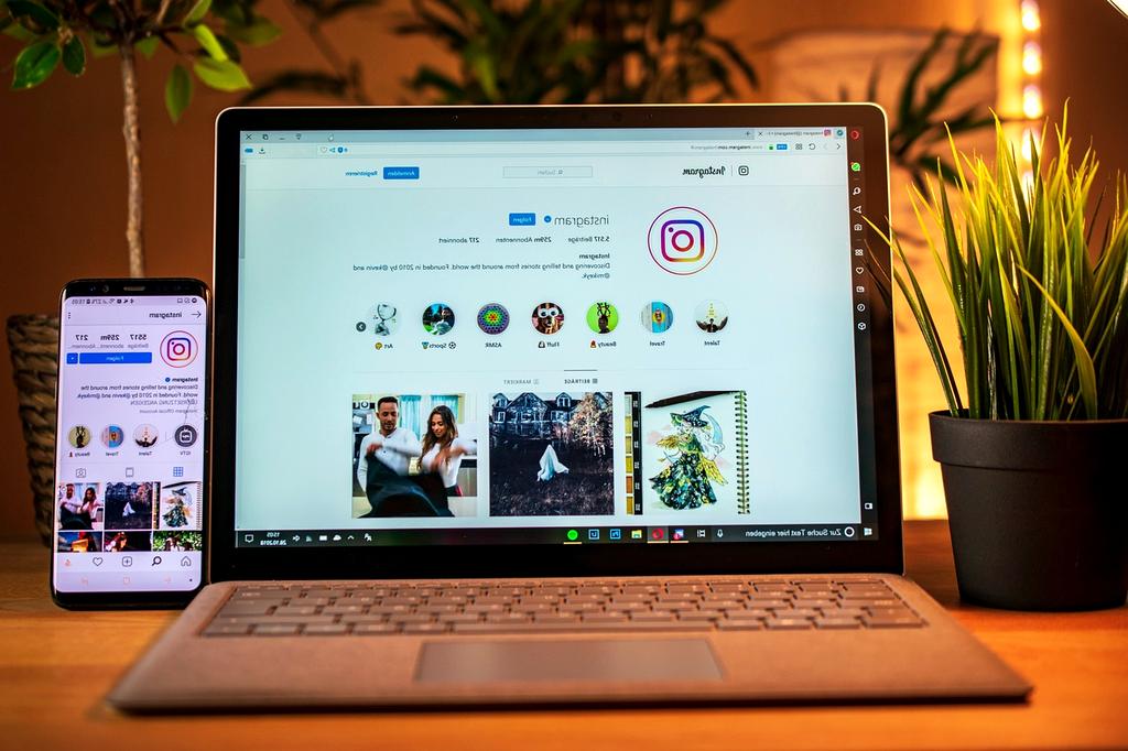 Digital book with glowing technological icons on screen