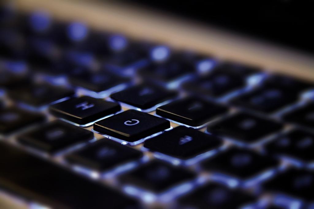 Futuristic quantum computing laboratory with holographic displays